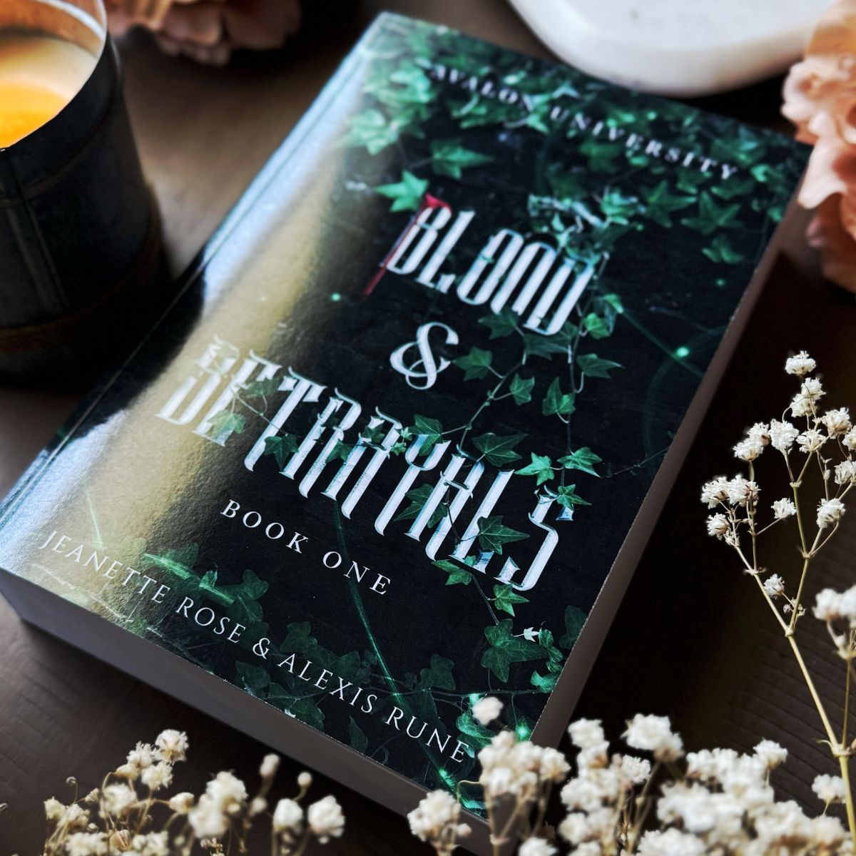 green book with the words blood & betrayals