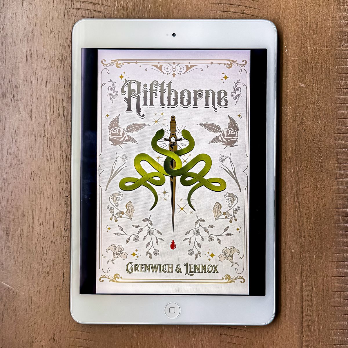 rift borne book on an iPad with brown background.