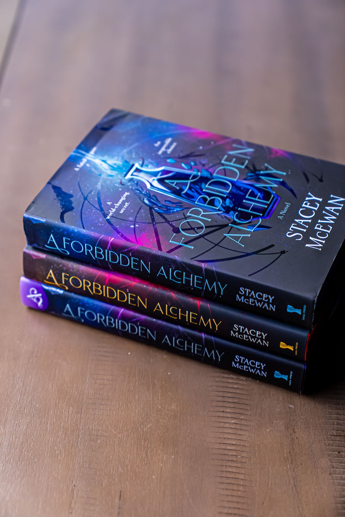 a stack of the A Forbidden Academy books