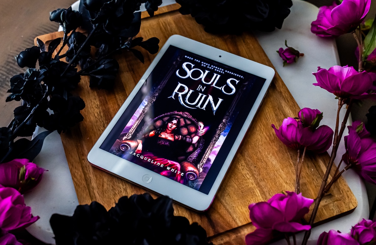 souls in ruin on an iPad with flowers.