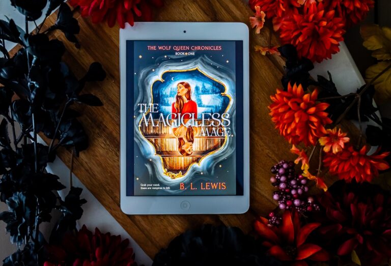 iPad with the Magicless Mage surrounded by flowers.