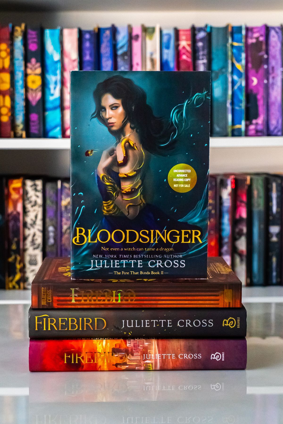 Bloodsinger book on top of 3 Firebird books.